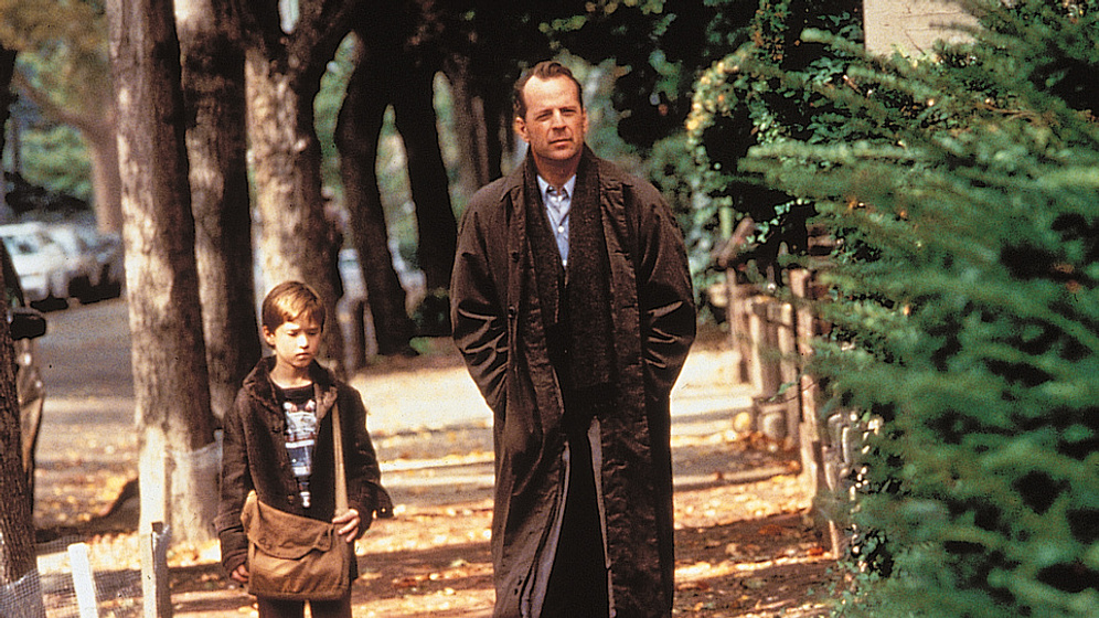 Bruce Willis y Haley Joel Osment en El Sexto Sentido