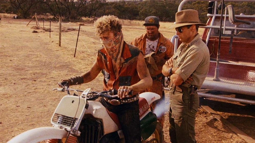 Peter Ford, Garry Who y David Sandford en Acoso Implacable
