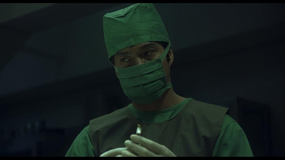 Koichi Sato en Rasen (Ring: The Spiral)