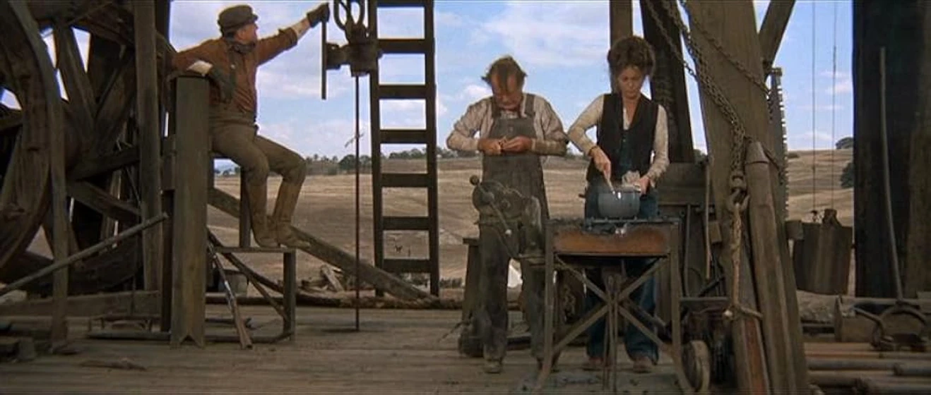 Faye Dunaway y George C. Scott en oklahoma-ano-10