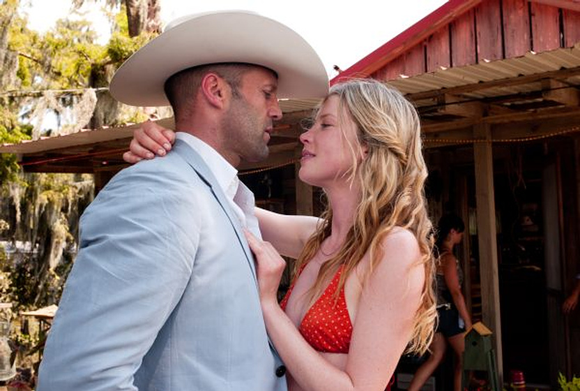Jason Statham y Emma Booth en Parker