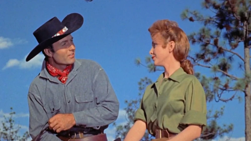 George Montgomery [I] y Sylvia Findley en nido-de-ladrones