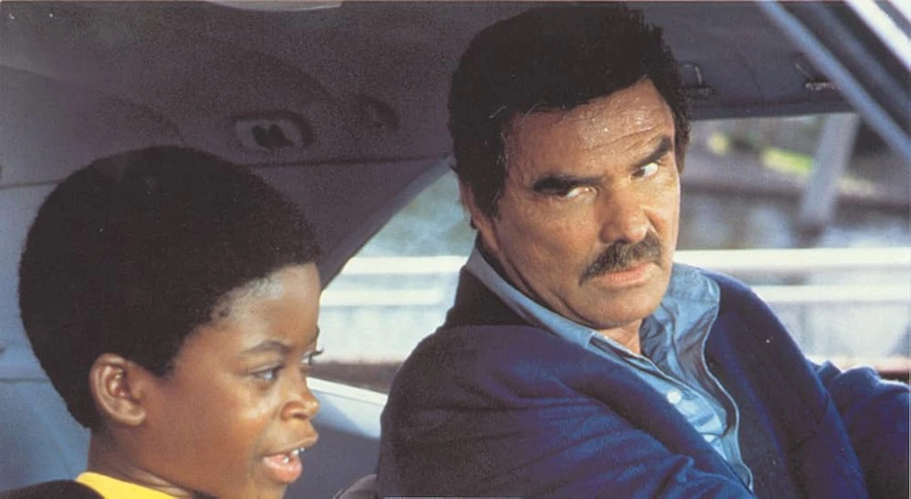 Burt Reynolds y Norman D. Golden II en un-policia-y-pico