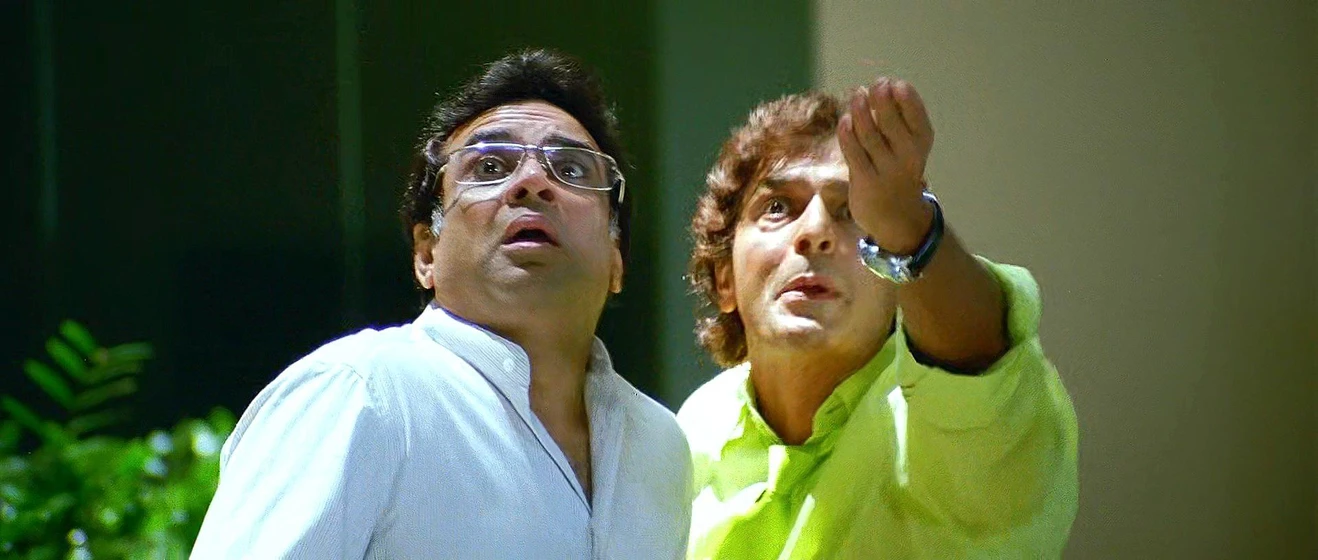 Paresh Rawal y Chunky Pandey en de-dana-dan