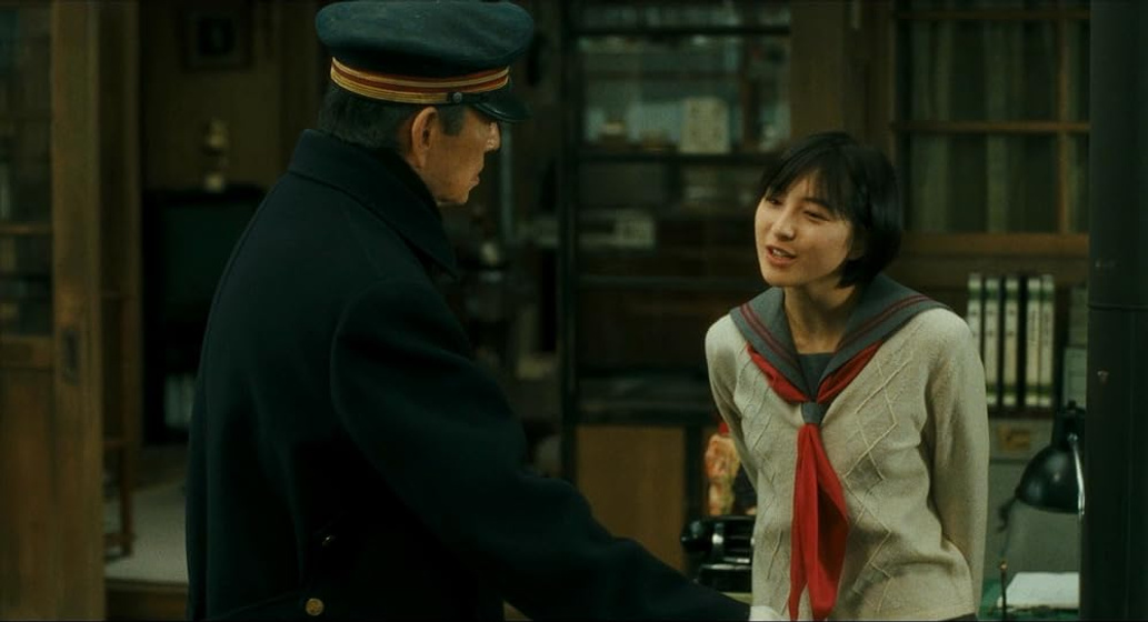 Ryoko Hirosue y Ken Takakura en poppoya-railroad-man