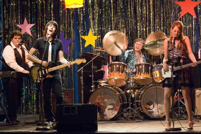 Rainn Wilson, Emma Stone y Josh Gad en Un Rockero de pelotas