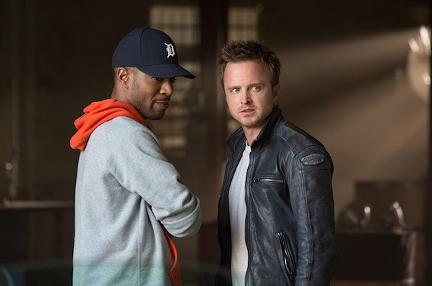Aaron Paul y Kid Cudi en Need for Speed