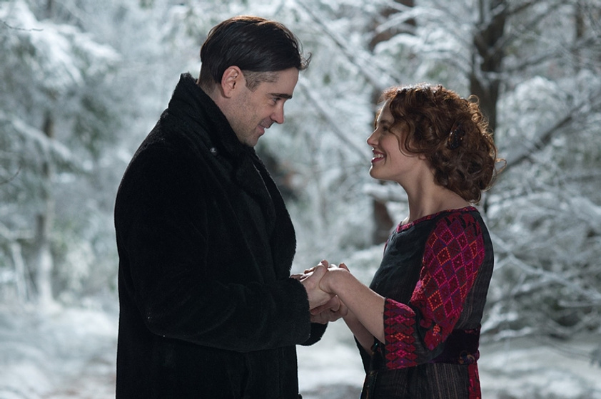 Colin Farrell [I] y Jessica Brown Findlay en Cuento de Invierno