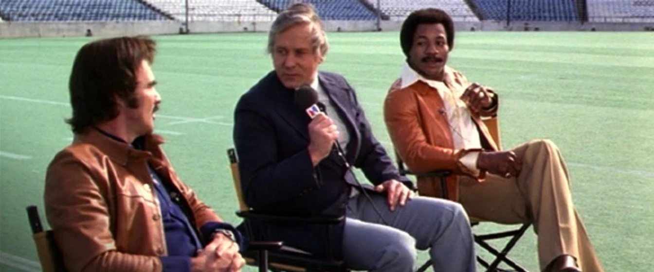 Burt Reynolds y Carl Weathers en dos-mas-uno-igual-a-dos