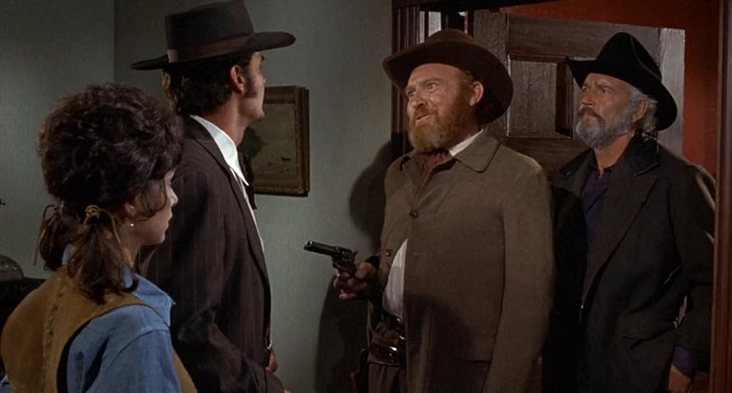 James Garner, Suzanne Pleshette, Gene Evans y Terry Wilson en Látigo