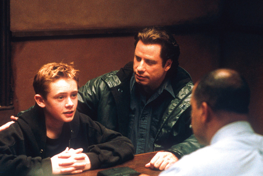 John Travolta y Matt O'Leary en Falsa Identidad