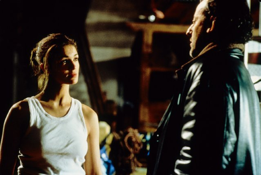 Jean Reno y Nadia Farès en Los Ríos de Color Púrpura