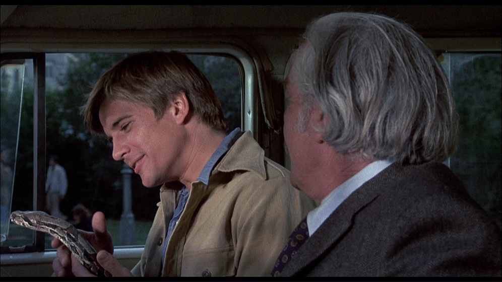 Strother Martin y Dirk Benedict en Sssssss: Silbido de Muerte