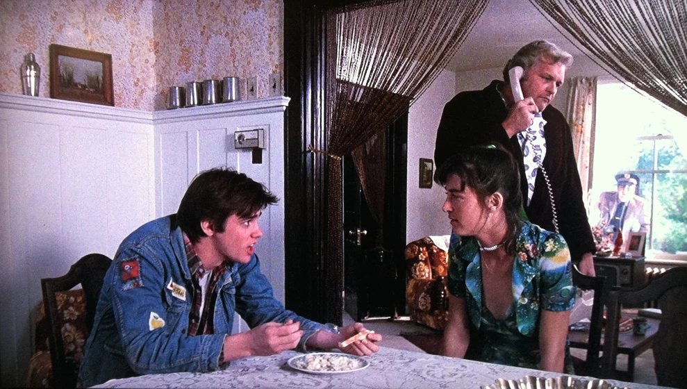 Jim Carrey y Brian Dennehy en finders-keepers-1984