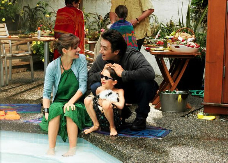 Amanda Peet, John Cusack y Bobby Coleman en El Niño de Marte