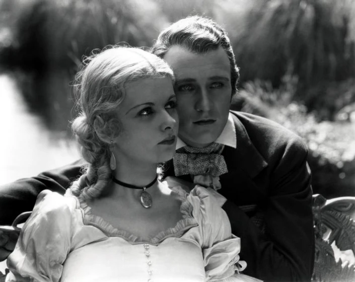 Anthony Bushell y Joan Bennett en disraeli