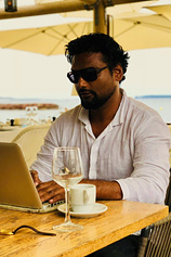 photo of person Paul Angunawela