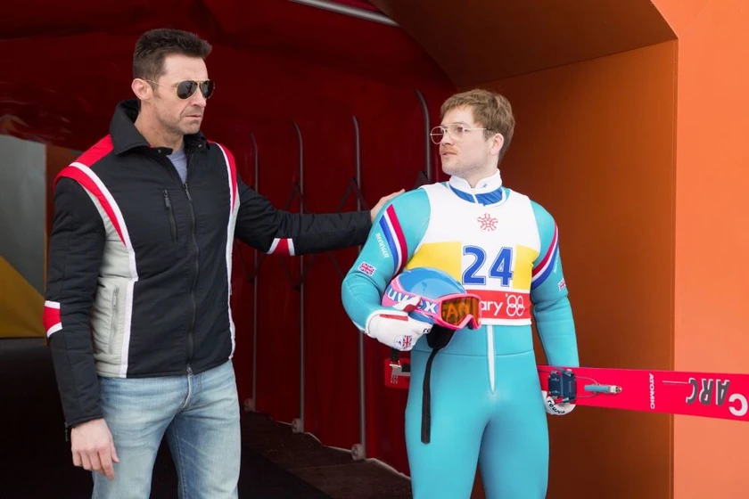 Hugh Jackman y Taron Egerton en eddie-el-aguila