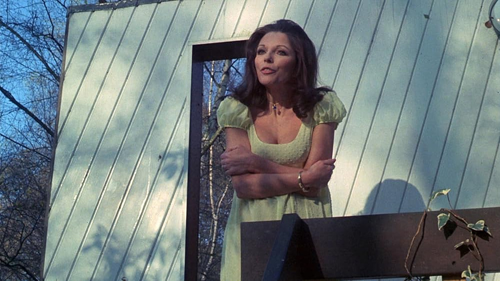 Joan Collins en las-orgias-de-la-locura