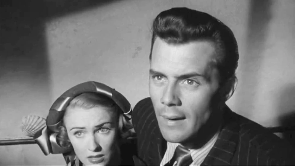Dirk Bogarde y Susan Shaw en una-mujer-en-entredicho