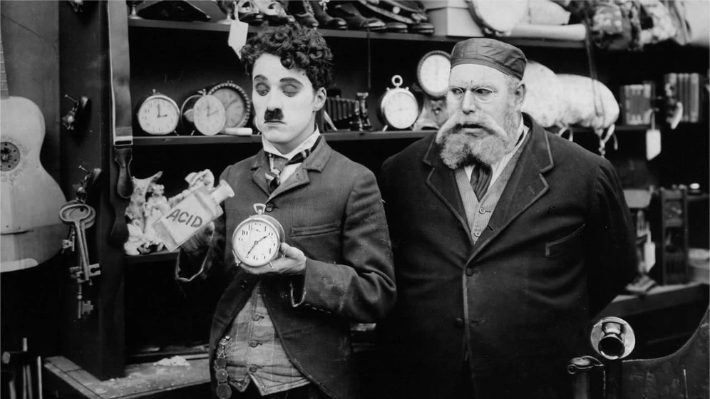 Charles Chaplin y Henry Bergman en charlot-prestamista