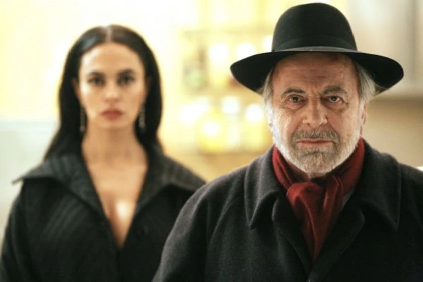 Maximilian Schell en flores-negras