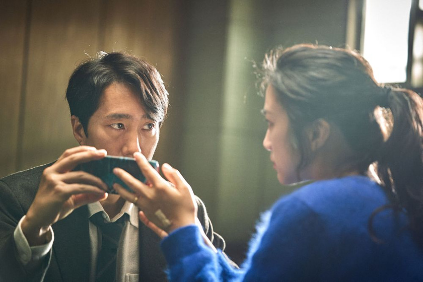 Park Hae-il y Tang Wei en Decision to Leave