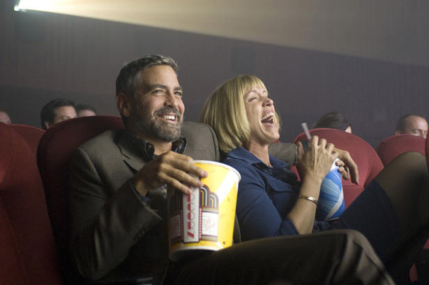 George Clooney y Frances McDormand en Quemar Después de Leer