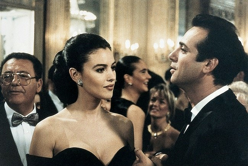 Monica Bellucci y Massimo Ghini en La Rifa