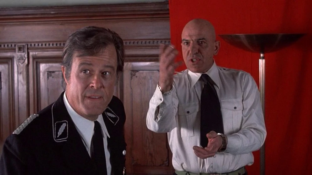 Telly Savalas y Robert Culp en berlin-1976