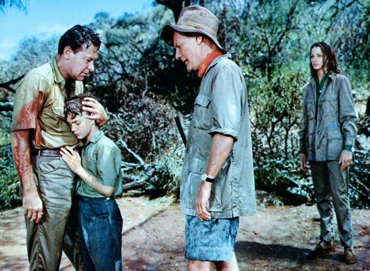 William Holden, Trevor Howard, Capucine y Pamela Franklin en el-leon