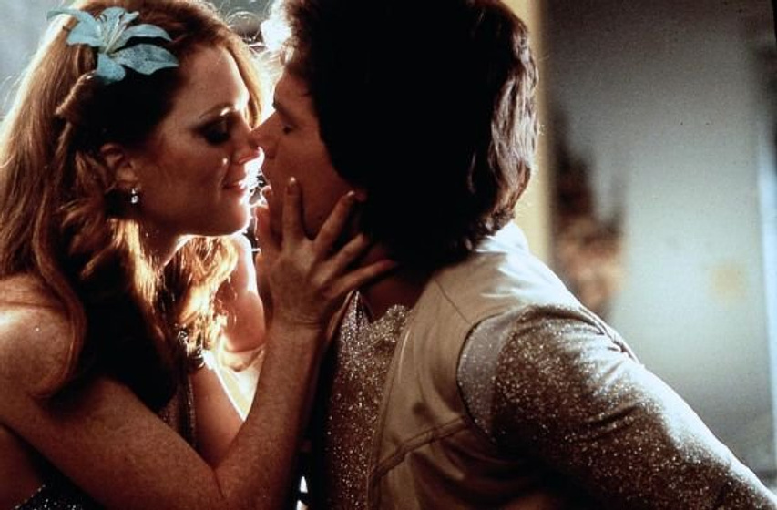 Mark Wahlberg y Julianne Moore en Boogie Nights