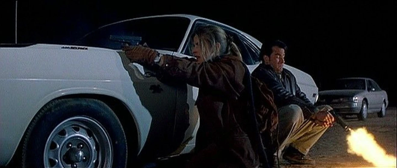 Charlie Sheen y Nastassja Kinski en velocidad-terminal