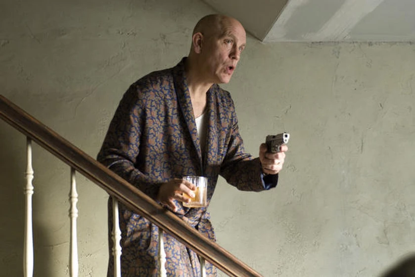 John Malkovich en Quemar Después de Leer