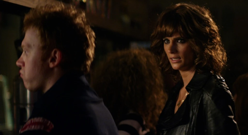 Rupert Grint y Stana Katic en CBGB