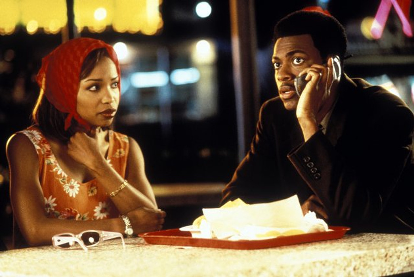 Chris Tucker y Elise Neal en El Dinero es lo Primero