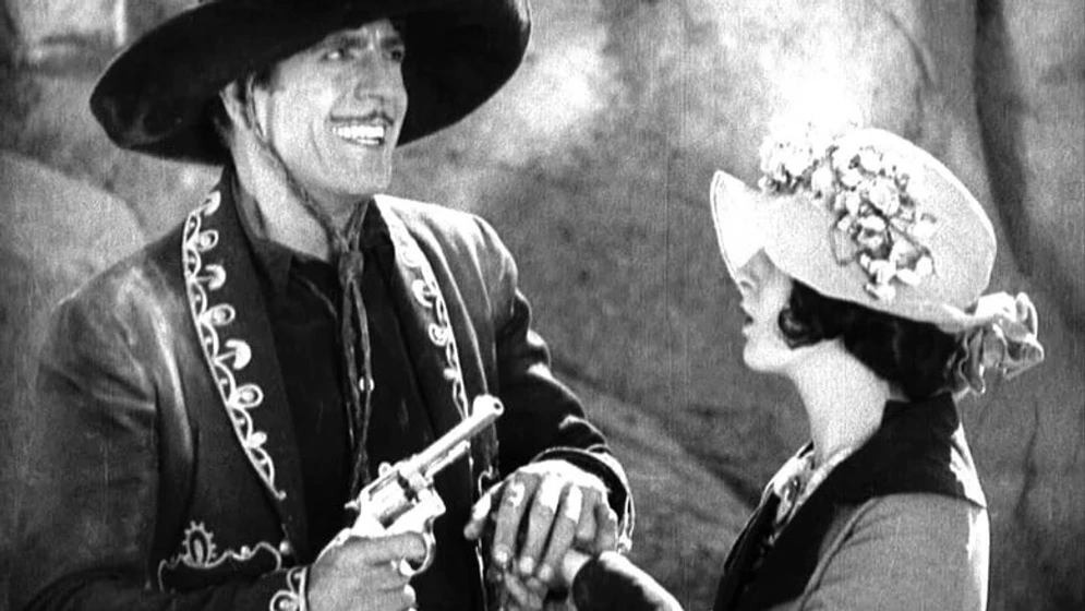Warner Baxter y Helen Lynch en en-el-viejo-arizona