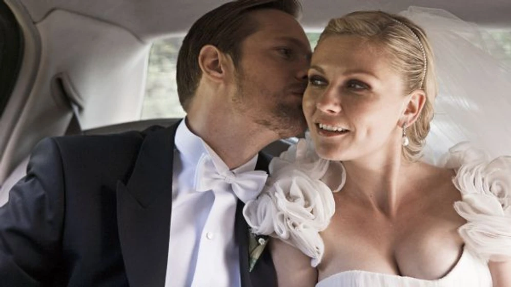 Kirsten Dunst y Alexander Skarsgård en melancolia