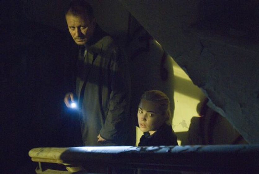 Melissa George y Stellan Skarsgård en Waz