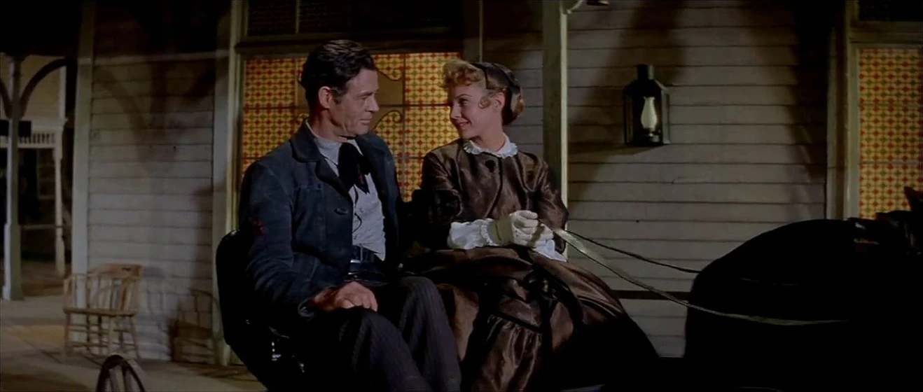 Robert Ryan y Virginia Mayo en tierra-de-violencia