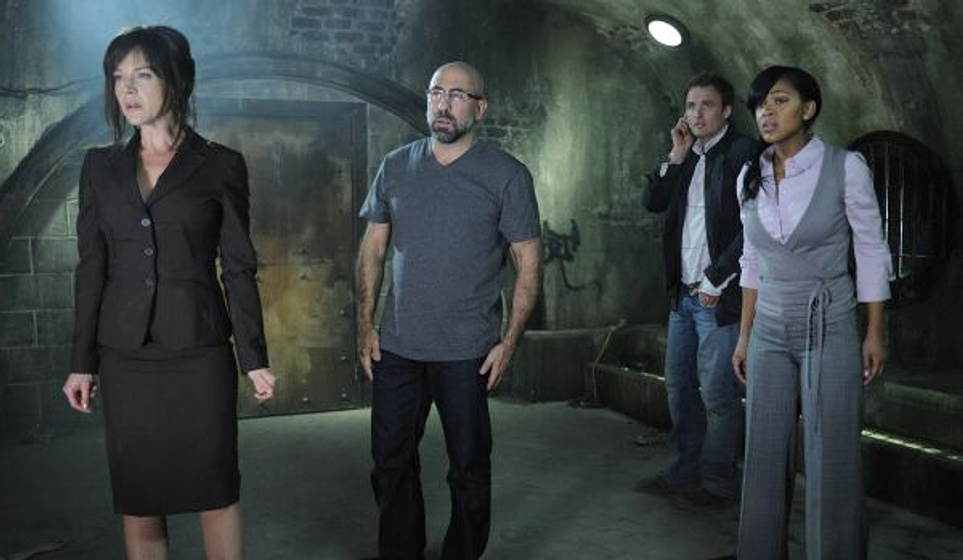 Julie Benz, Meagan Good, Greg Bryk y Carlo Rota en Saw V