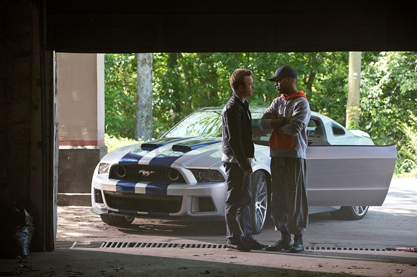 Aaron Paul y Kid Cudi en Need for Speed