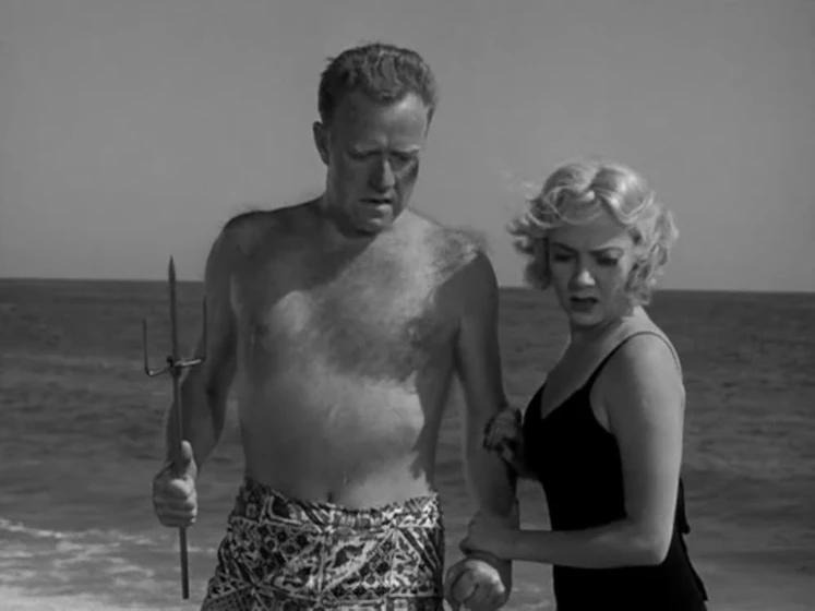 Lloyd Gough y Audrey Totter en tension