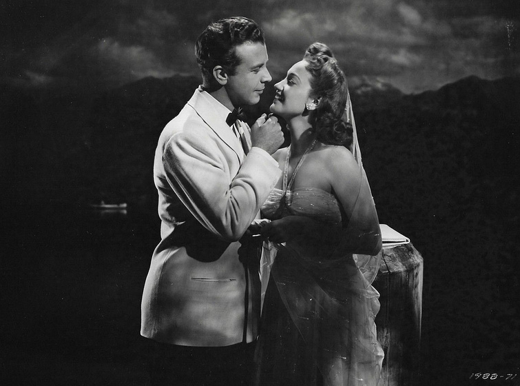 Dick Powell y Dorothy Lamour en En la Cumbre de la Felicidad