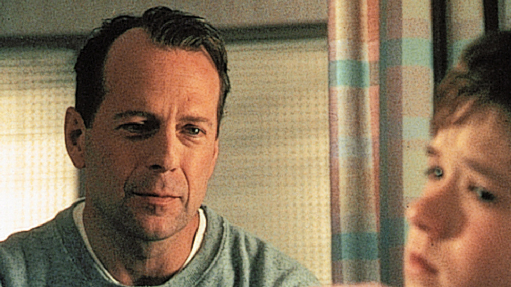 Bruce Willis y Haley Joel Osment en El Sexto Sentido