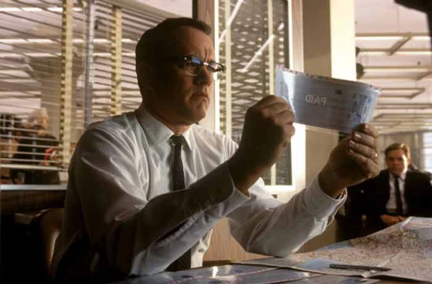 Tom Hanks en atrapame-si-puedes