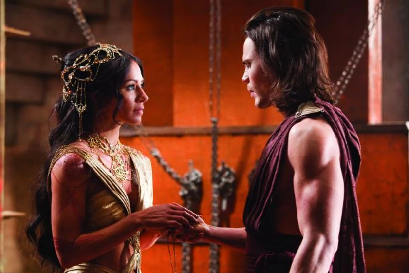 Lynn Collins y Taylor Kitsch en John Carter