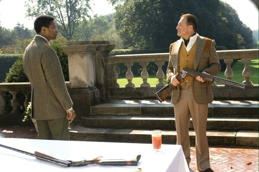 Armand Assante y Denzel Washington en American Gangster