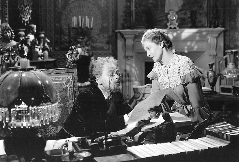 Paul Muni y Gloria Holden en La Vida de Émile Zola