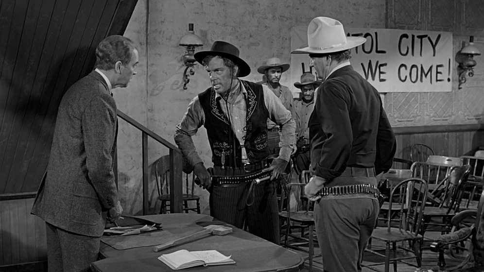 James Stewart, John Wayne y John Wayne en El Hombre que Mató a Liberty Valance